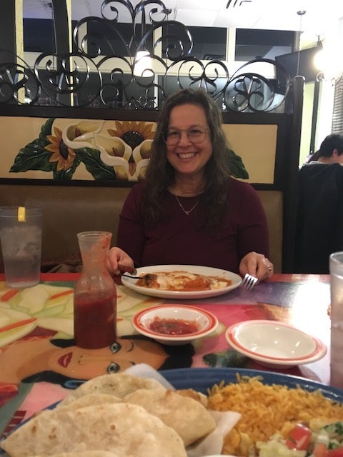 My mom across the table from me at Lupita's, a Mexican restaurant