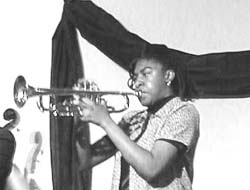 Photo of Shanelle Jenkins playing jazz trumpet