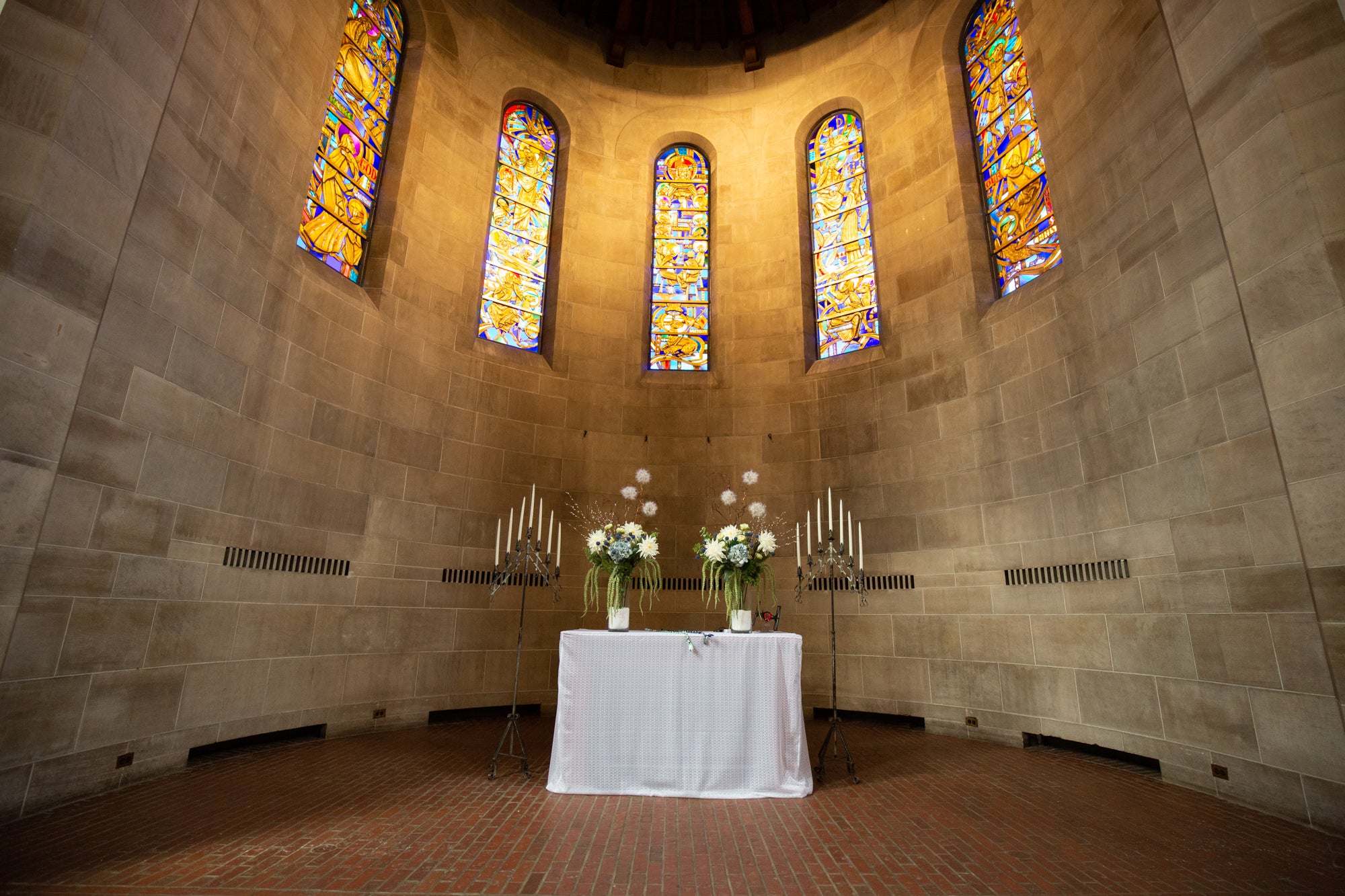 Flowers and candelabras on the Chapel stage
