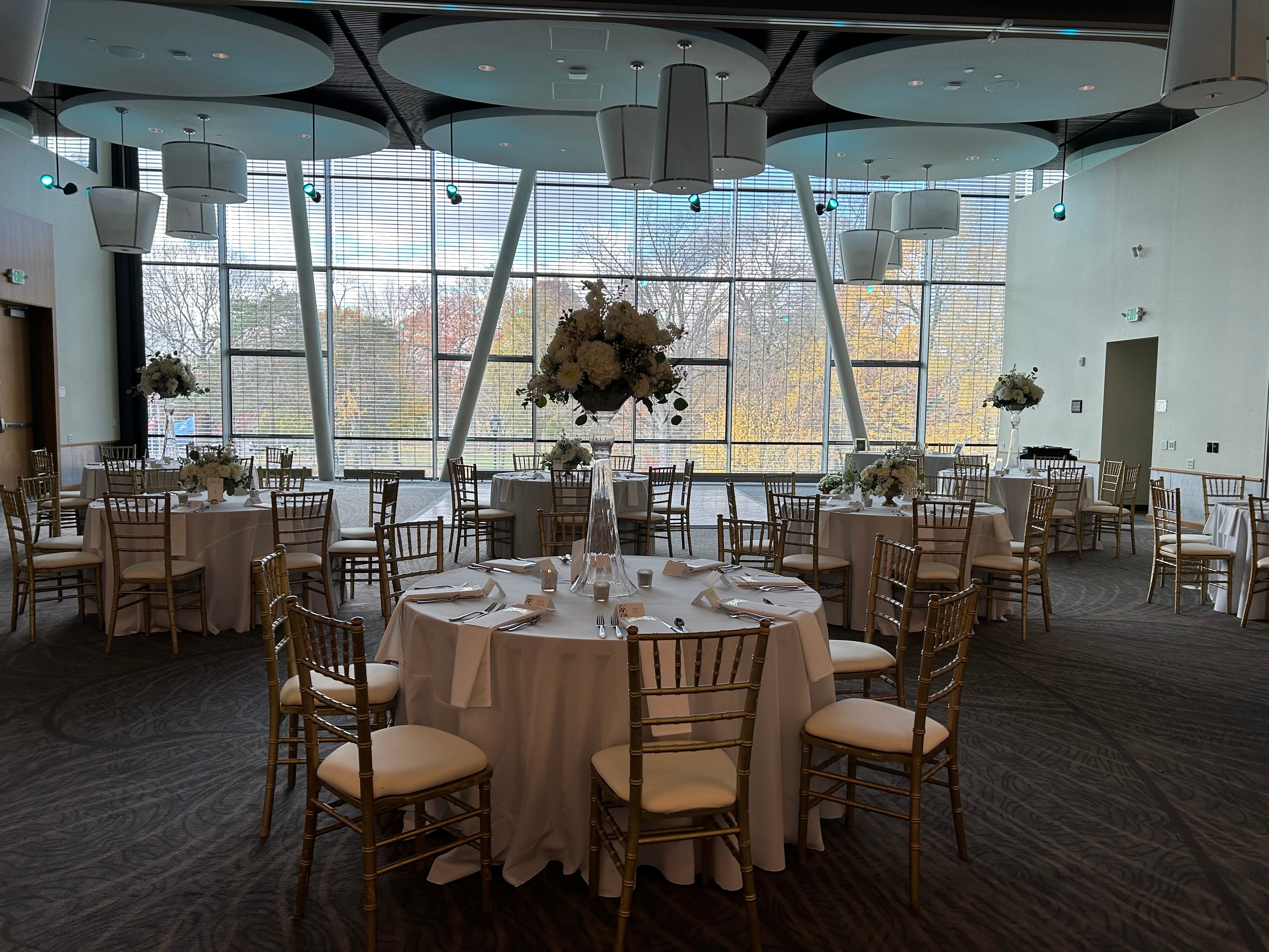Hotel reception space with decorated tables and chairs