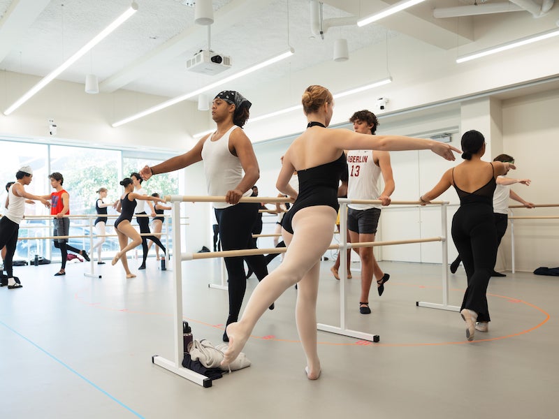 students practicing in dance class.