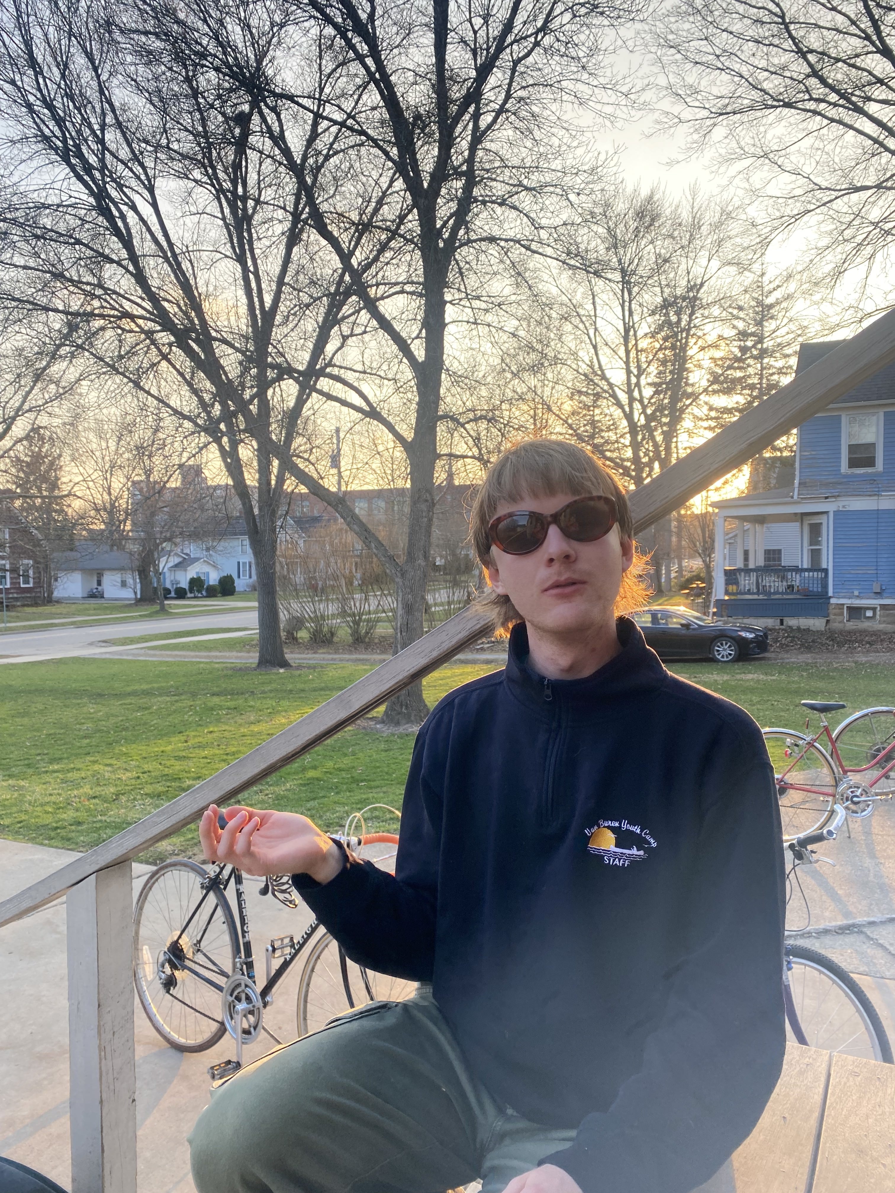 Eric wearing sunglasses, facing the camera