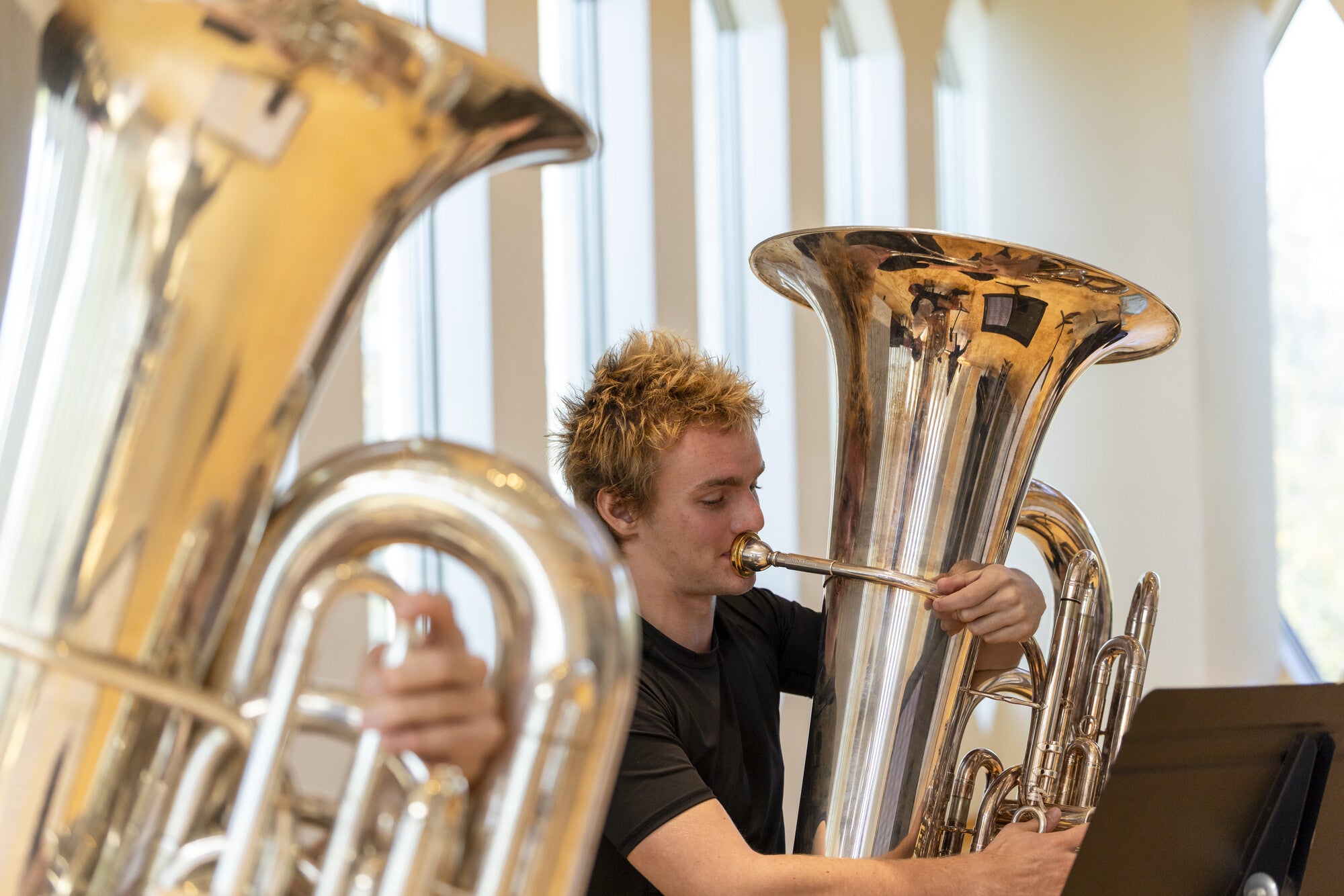 A Conservatory tuba student rehearsing.