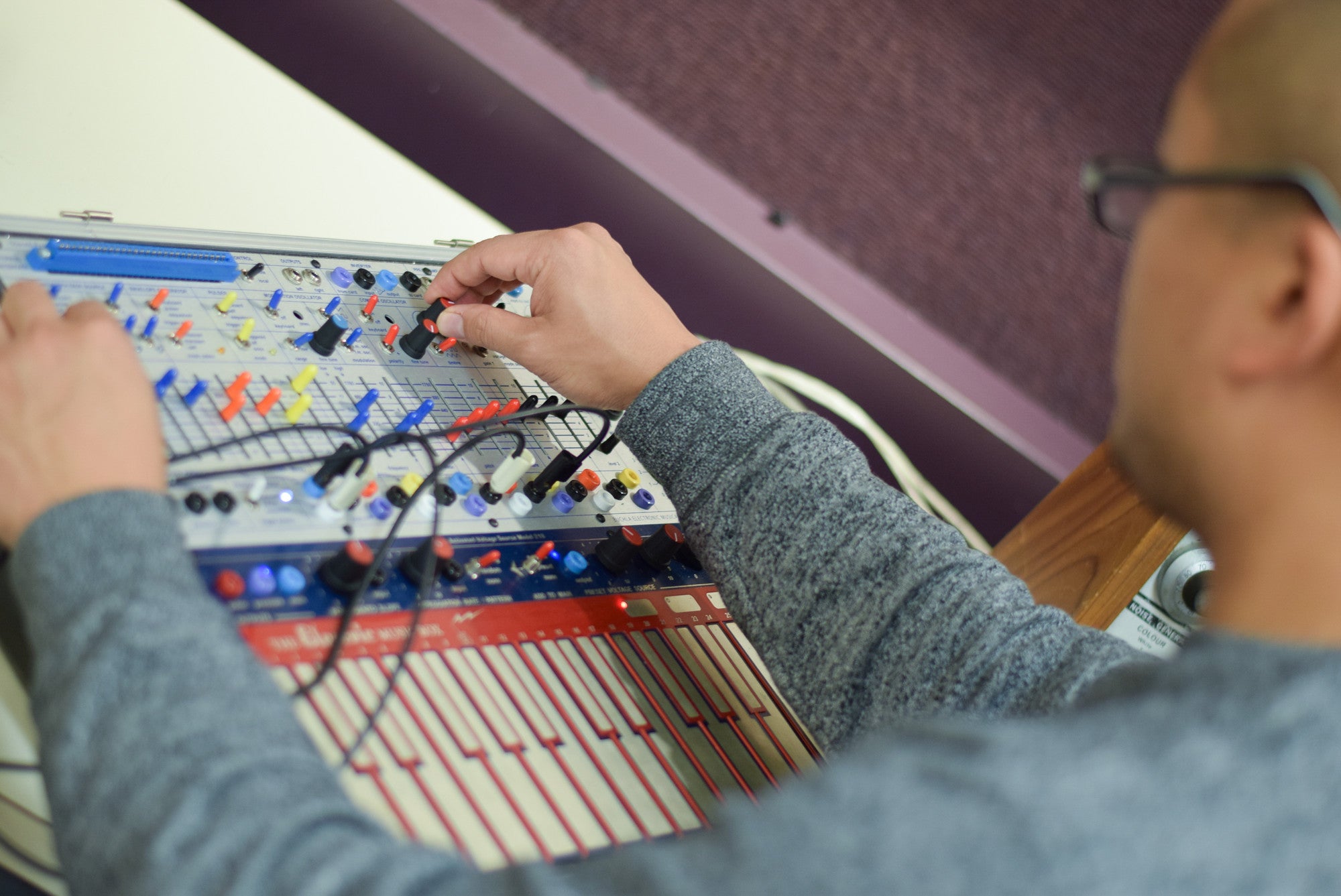 person at electroacustic keyboard