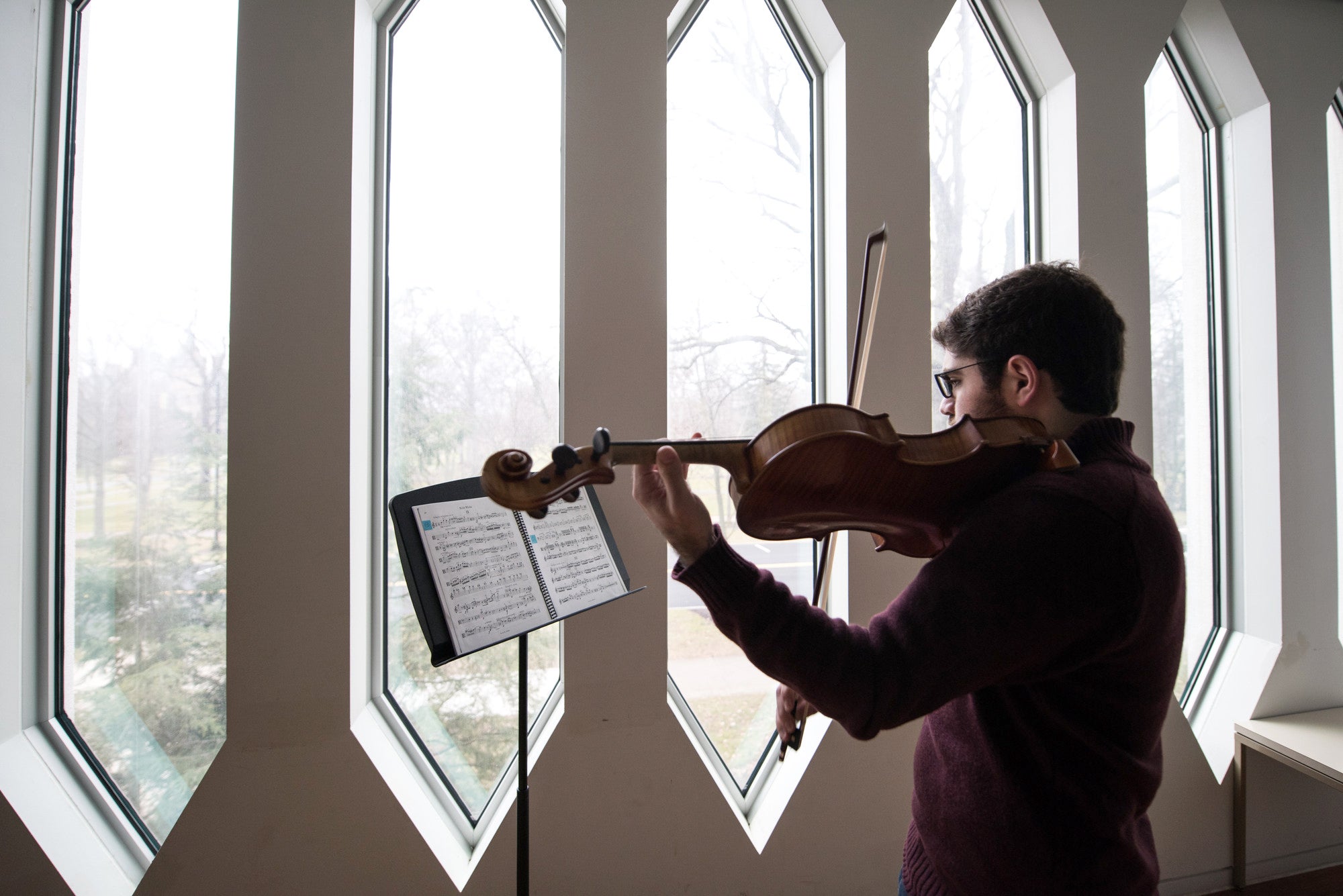 violist in practice room