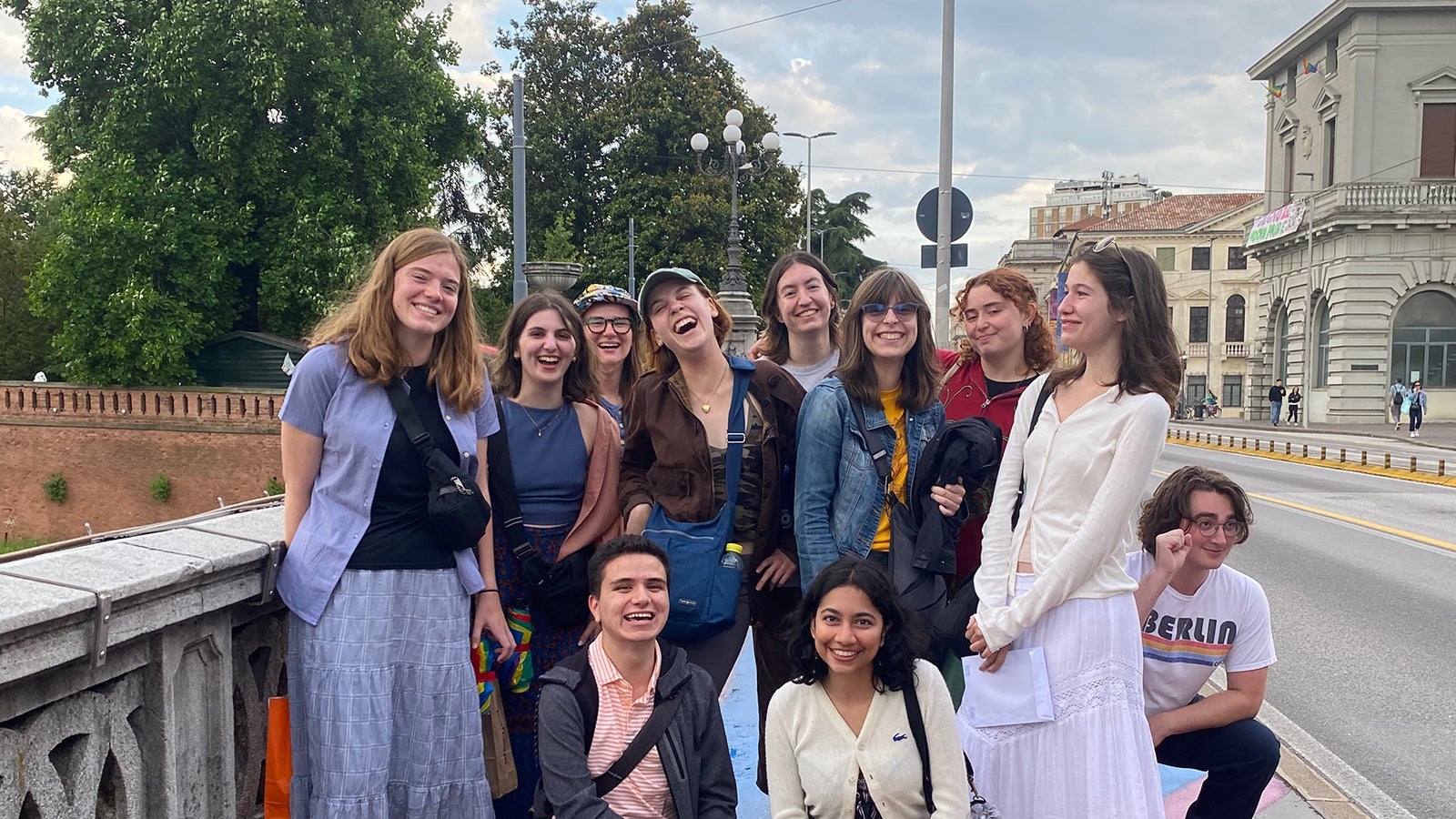 A group of English students posing for the camera.