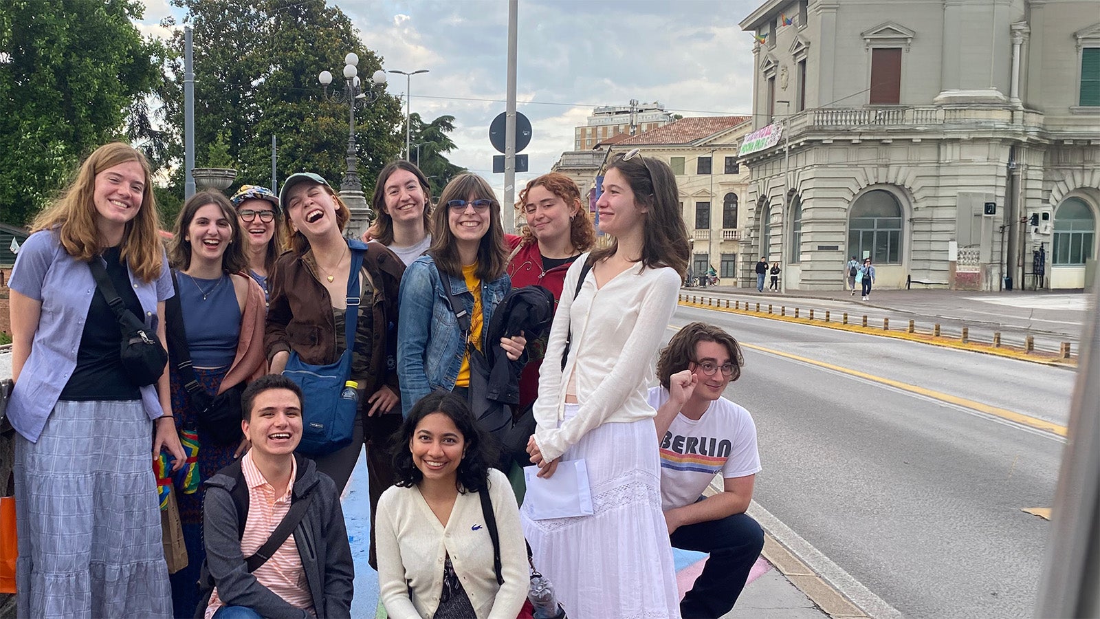 A group of English students posing for the camera.