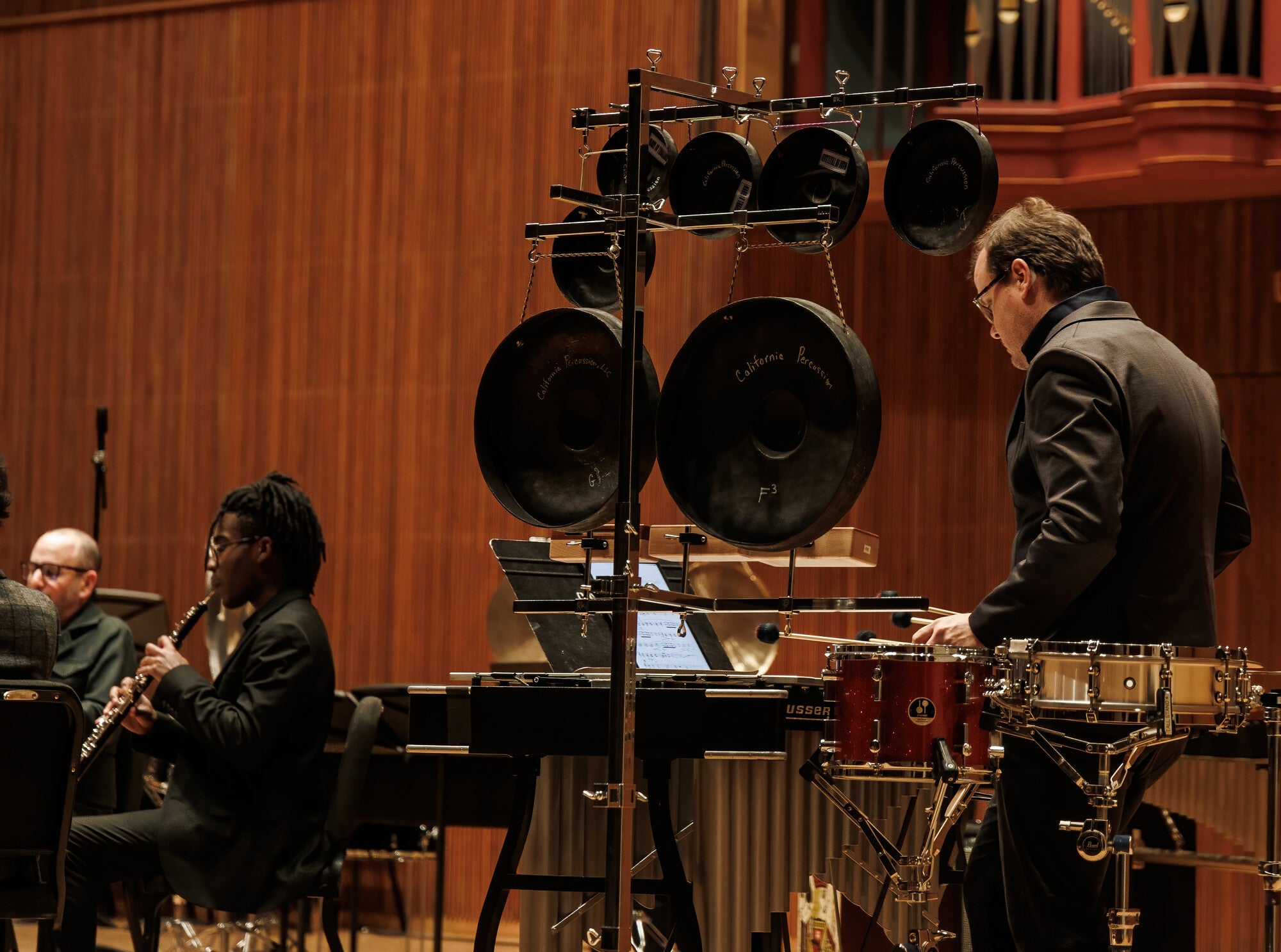A performer with percussion equipment.