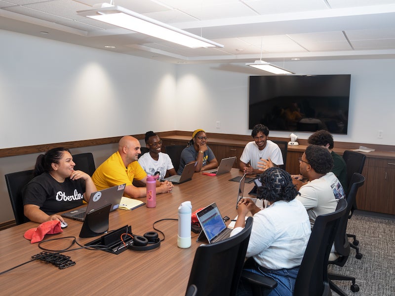 students meeting in a conference room.