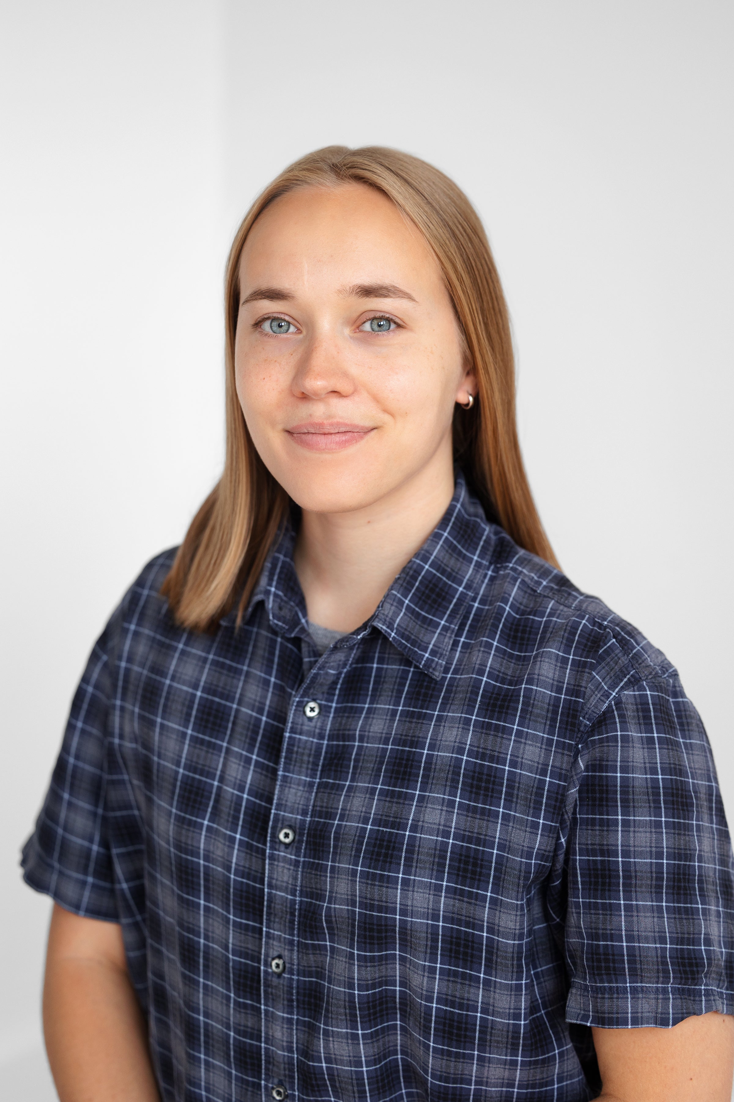 Sparrow Fuller wearing a blue plaid shirt.