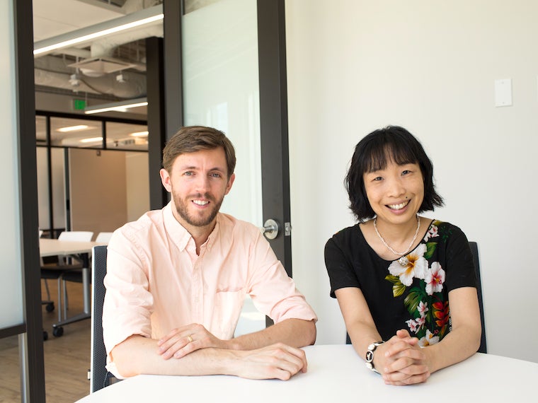 two faculty in small room