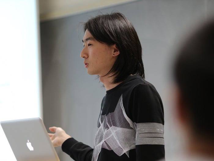 A student presents in a classroom.