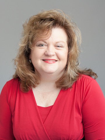 Head shot photo of Claudia Ferrini.