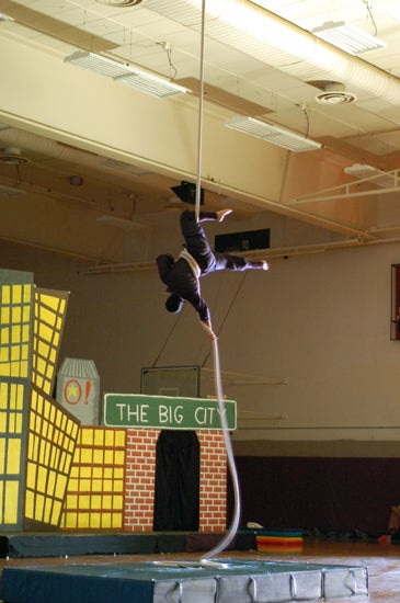 A performer aerial dancing