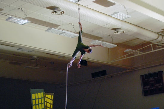 A performer aerial dancing