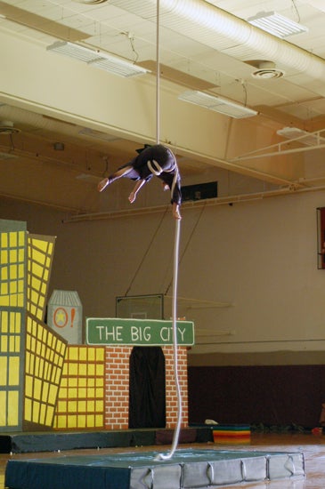 A performer aerial dancing