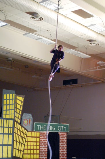 A performer aerial dancing