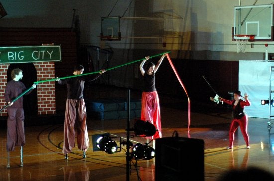 performers on stilts