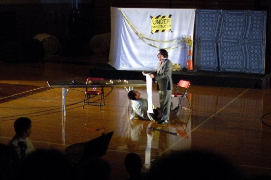 Performers act on the floor