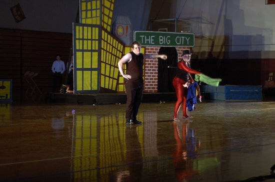 Two performers on the floor