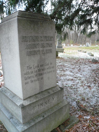 A large grave marker. Inscription: Charles C. Finney, August 29, 1793, August 16, 1875. The Lord our God be with us as He was with our fathers; let Him not leave us nor forsake us.