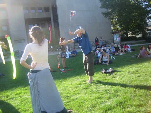 People juggling at TGIF