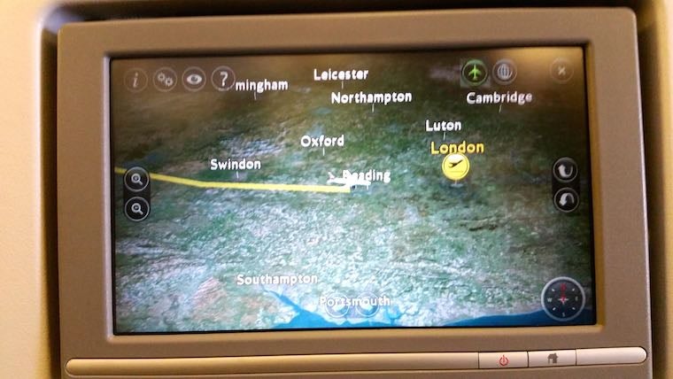 Flight screen with a map of England indicating that the flight is approaching London 