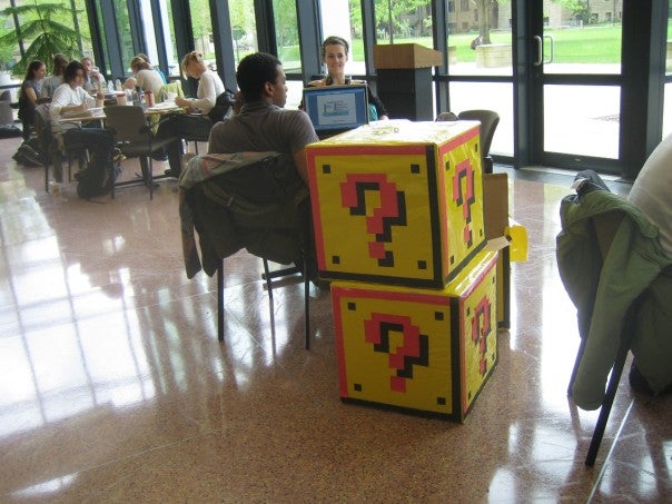 Giant Mario boxes with question marks stacked in the Science Center 