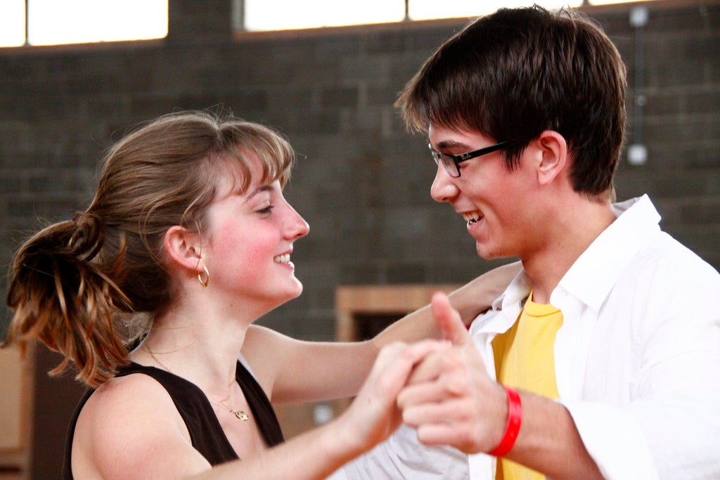 Two students partner dancing