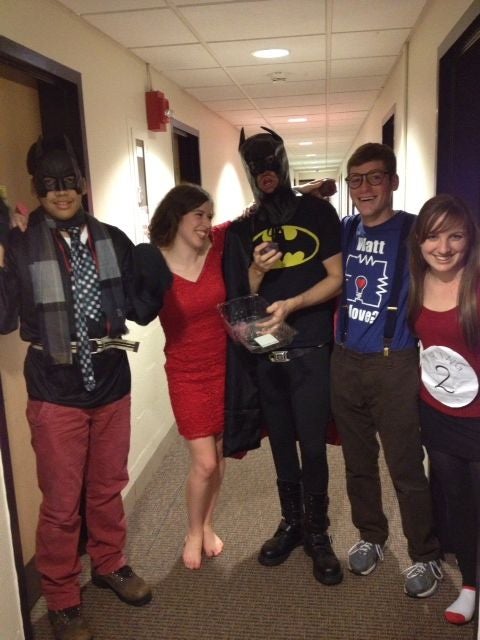 Batman and friends in the hallway