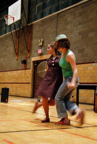 Two students partner dancing