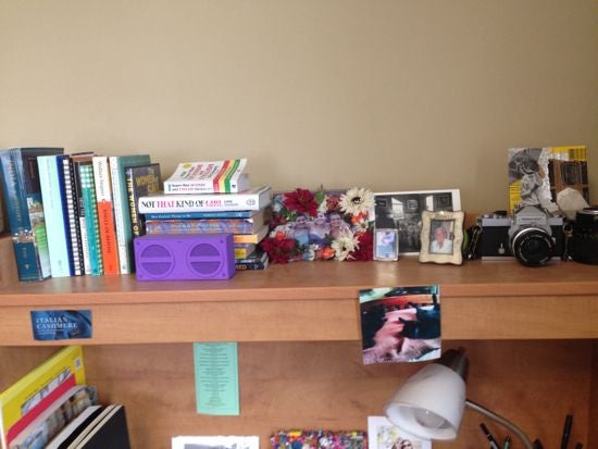 Desk shelf with organized books