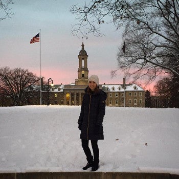 Celina on a snowy campus.