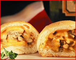 Bread roll with cheese and meat filling 