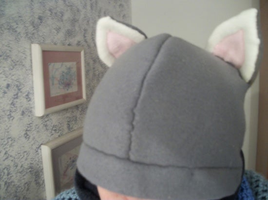 A gray hat with cat ears 