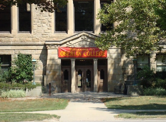 A stone building with a banner over the entrance: Welcome to Oberlin.