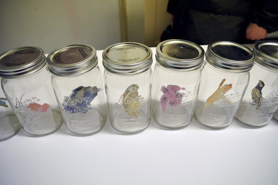 An art piece of figures inside of jars