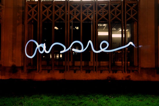 A cursive light painting of the name Cassie