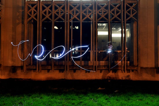 A cursive light painting of the name Tess 