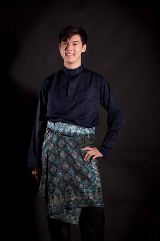 Pang wearing traditional Malay clothing