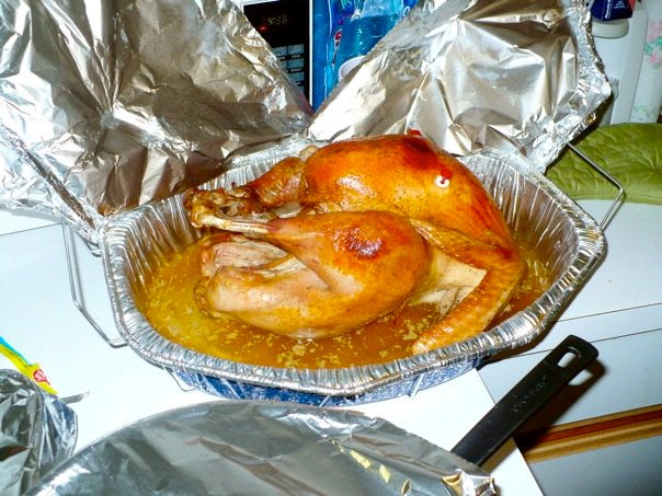 Roast turkey in a baking pan