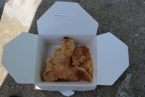 Peach pie in a take-out container 