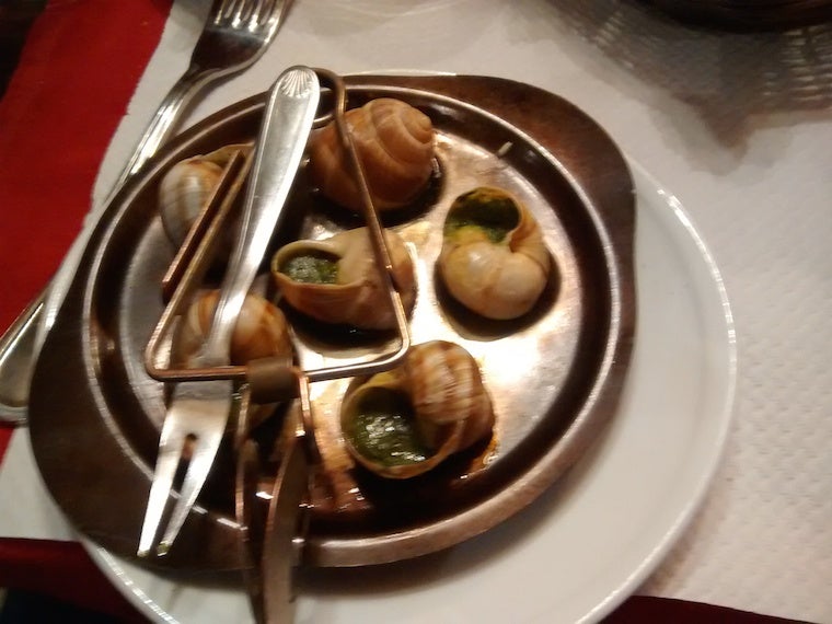 Snail shells filled with pesto