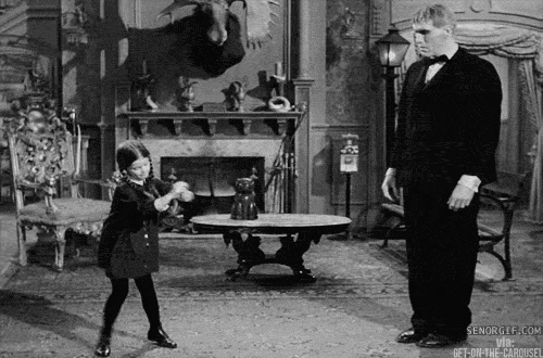 Wednesday Addams dancing in an animated GIF from the old Addams Family television show