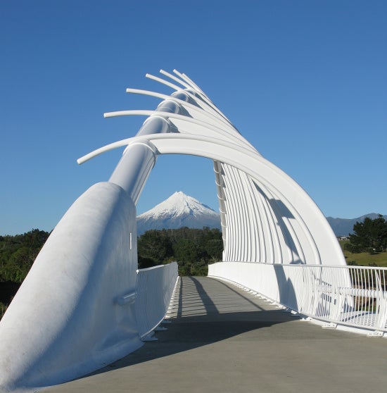 Contemporary bridge with a mountain in the distance