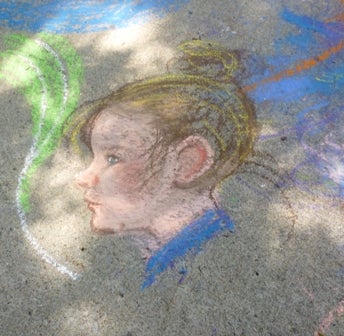 Chalk drawing of a girls profile