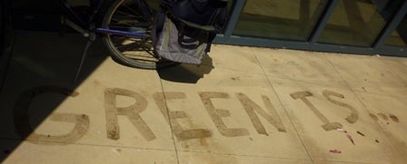 "Green is..." written on a sidewalk