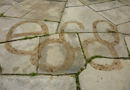 "Eco" written on a sidewalk