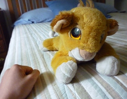 A plush toy, Simba from the Lion King.