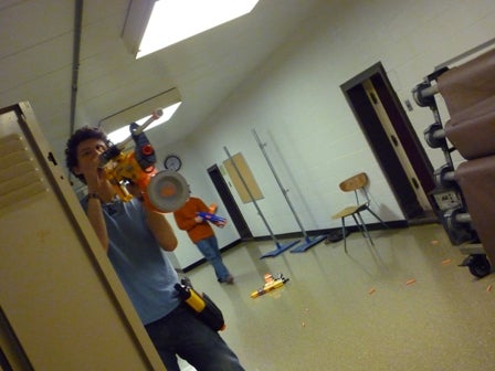 A student shoots a nerf gun